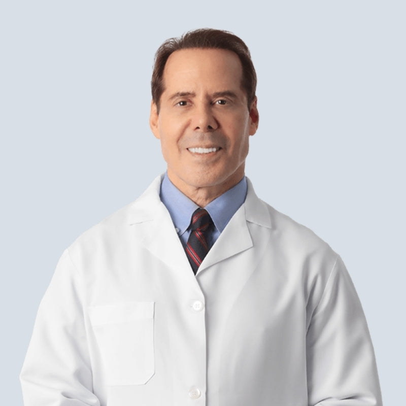 a tall men doctor with Smile