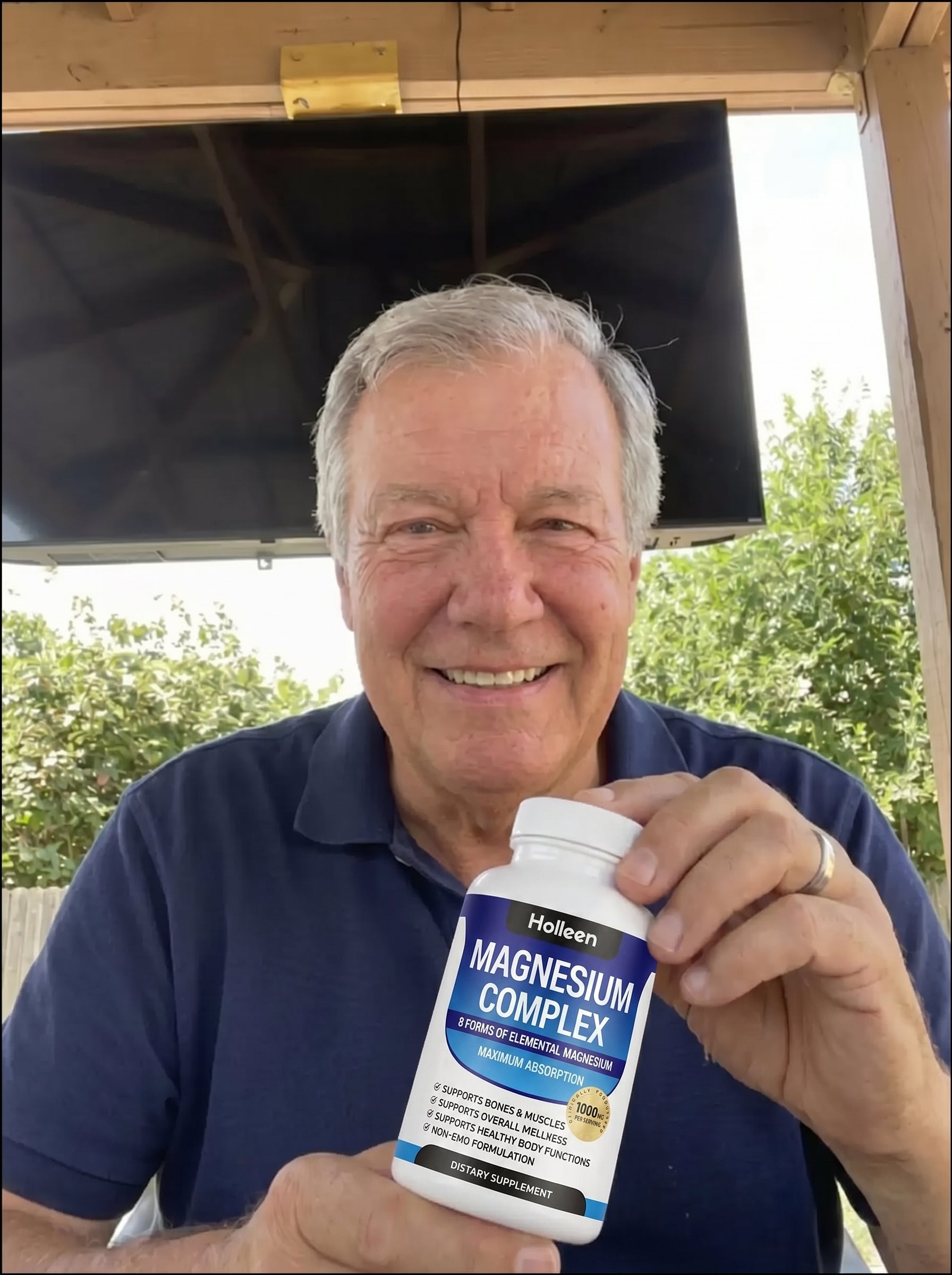 An older man holding Holleen's Magnesium.