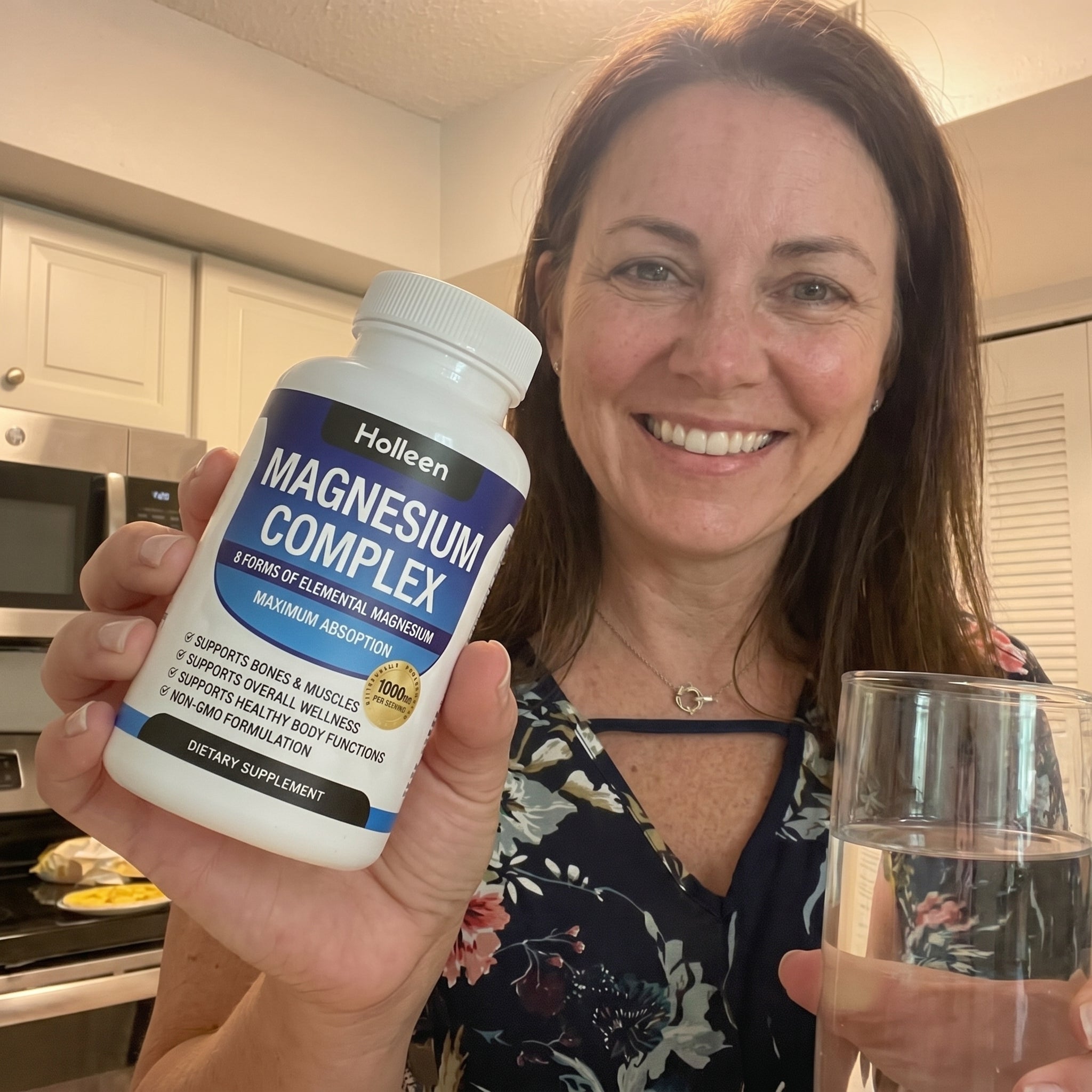 An older woman holding Holleen's Magnesium.